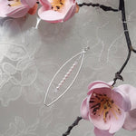Long Elliptical Mini Pearl Necklace.