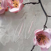 Elliptical Mini Pearl Long Earrings.